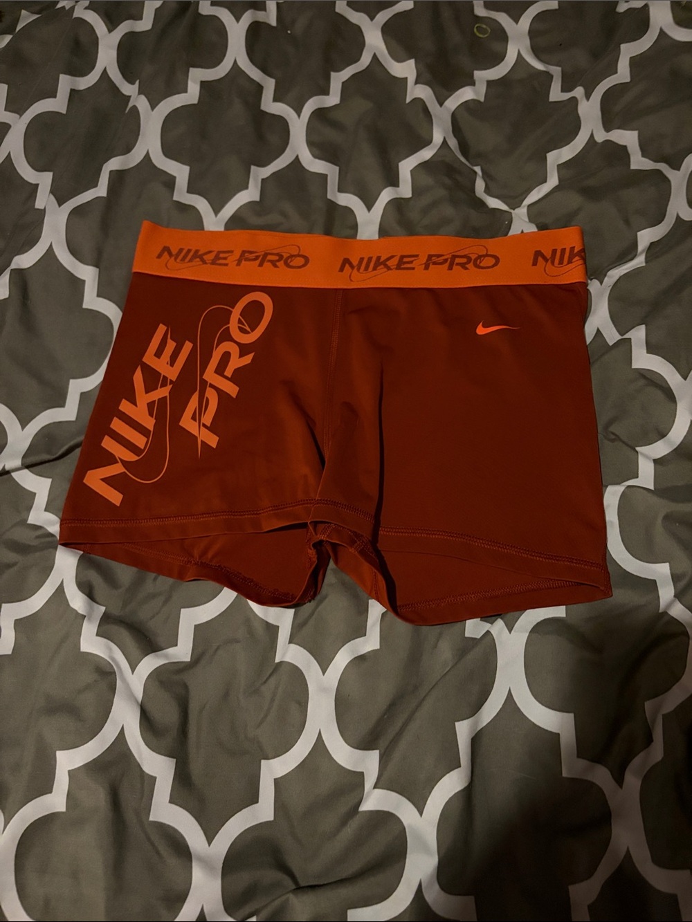 Nike Women's Compression Shorts — Burnt Orange with Bright Orange Logo